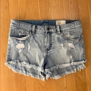 Cosmic Blue distressed denim shorts